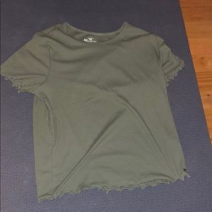 Brand new green ruffled Hollister shirt.